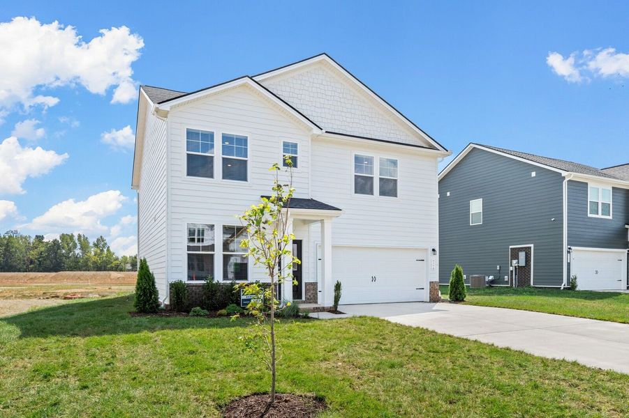 Front exterior of a new home in Calista Farms, White House, TN, highlighting curb appeal (Image 18).