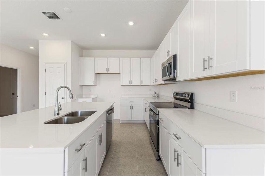Furnished interior view inside a new home in Mirror Lake Village, Fruitland Park (Image 4).