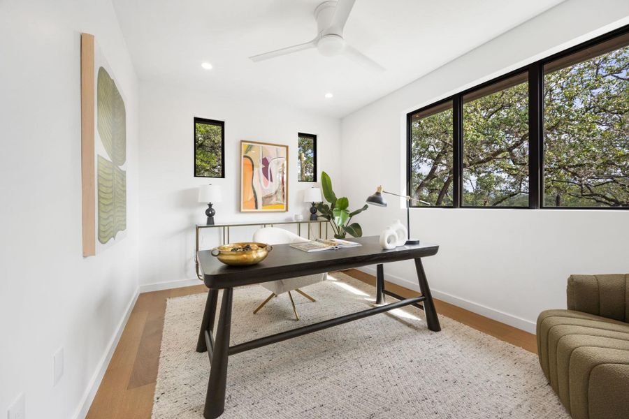 Office area featuring recessed lighting, light wood-type flooring, and a ceiling fan