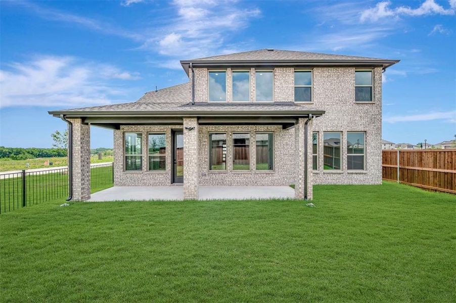 Exterior details and patio area of a home in Lily Creek at Sutton Fields, Aubrey (Image 20). Exterior details and patio area of a home in Lily Creek at Sutton Fields, Aubrey (Image 20).