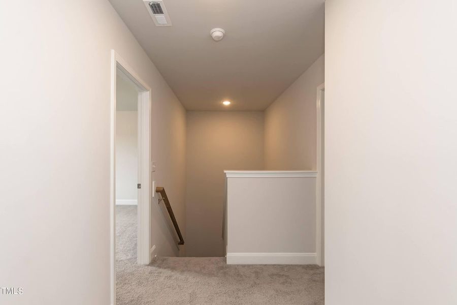 Representative unfurnished interior of a home built from the 2913 by Adams Homes in Hidden Pines, Cameron (Image 33).