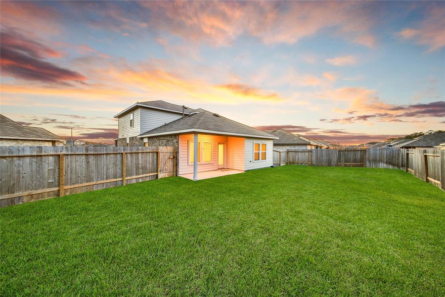 Exterior details and patio area of a home in Breckenridge Forest, Spring (Image 4).
