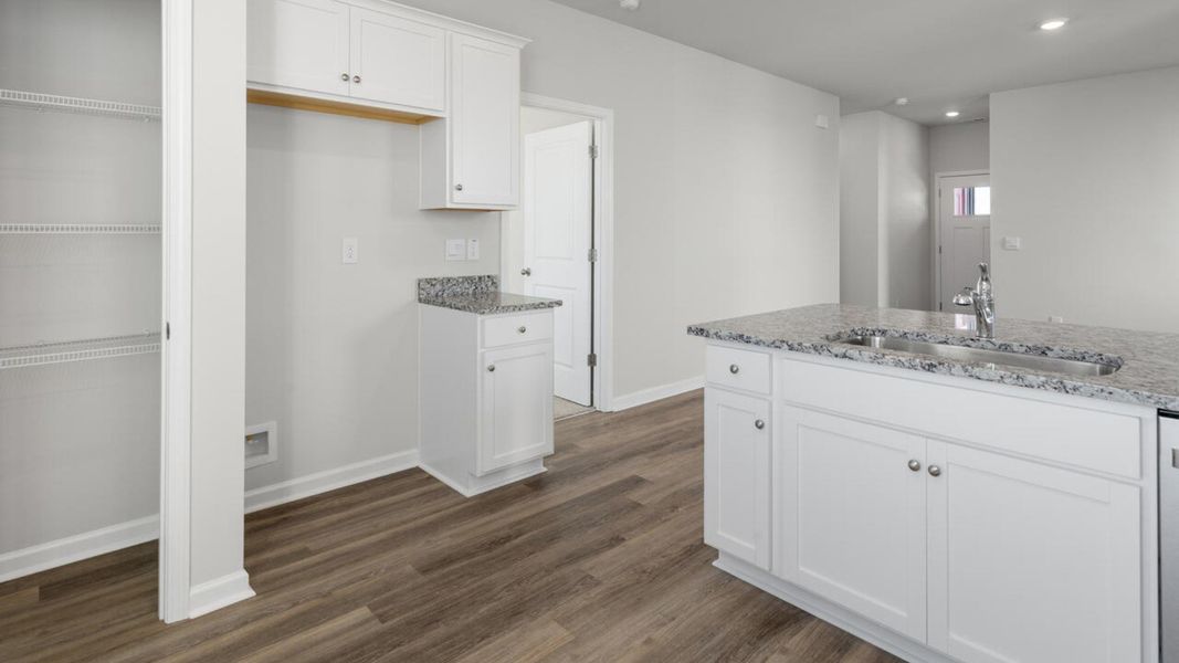 Representative furnished interior of a home built from the PERRY by D.R. Horton in The Cottages at Blake Farm, Wilmington (Image 11).