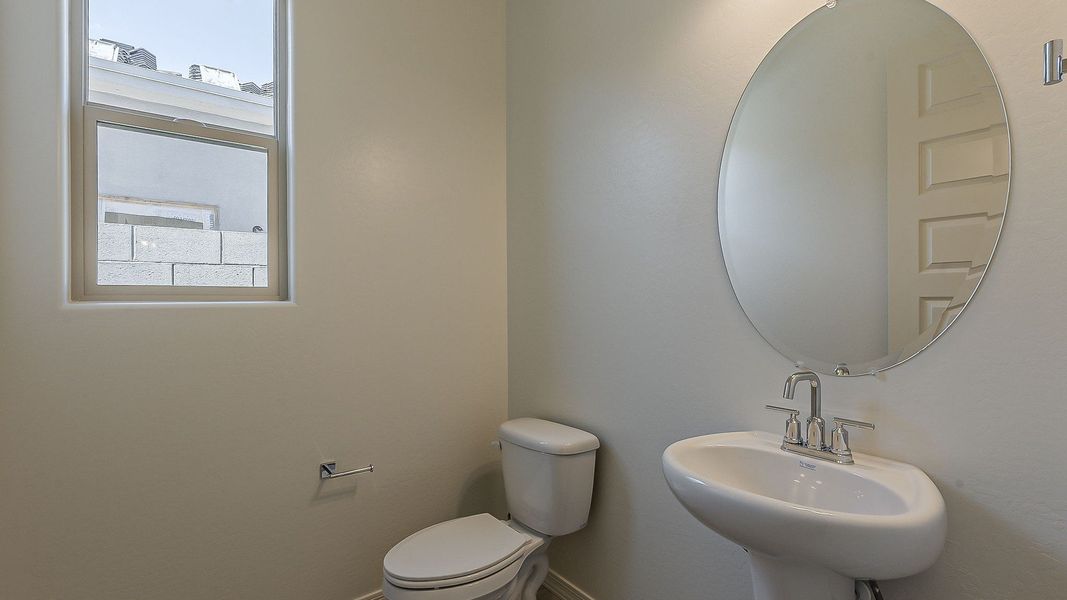 Furnished interior view inside a new home in Windrose, Waddell (Image 39).