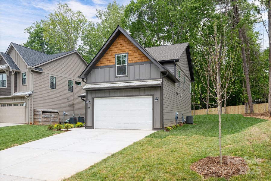 Front exterior of a new home in , Arden, NC, highlighting curb appeal (Image 24). Front exterior of a new home in , Arden, NC, highlighting curb appeal (Image 24).