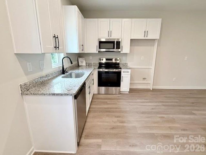 Furnished interior view inside a new home in , Bessemer City (Image 17).
