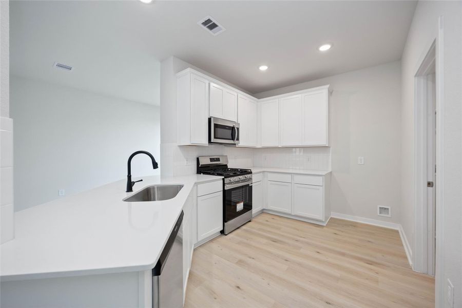 Furnished interior view inside a new home in Bluestem, Brookshire (Image 10). Furnished interior view inside a new home in Bluestem, Brookshire (Image 10).