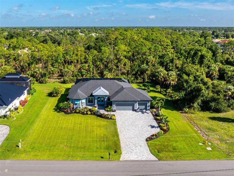 Front exterior of a new home in , Rotonda West, FL, highlighting curb appeal (Image 28).