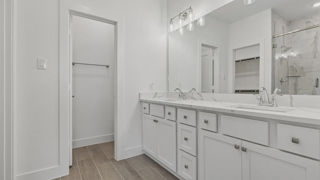 Furnished interior view inside a new home in Meridiana Townhomes, Iowa Colony (Image 10).