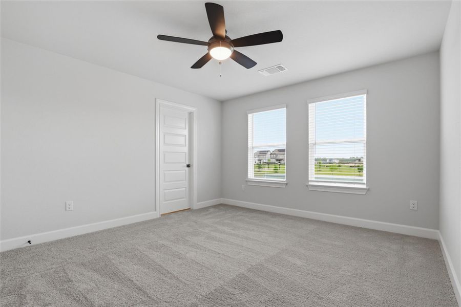 Spacious, unfurnished interior of a new home in Whisper Valley, Manor (Image 22).