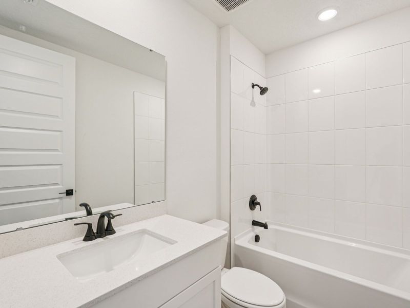 Furnished interior view inside a new home in Oakfield Trails - Signature Series, Parrish (Image 4).