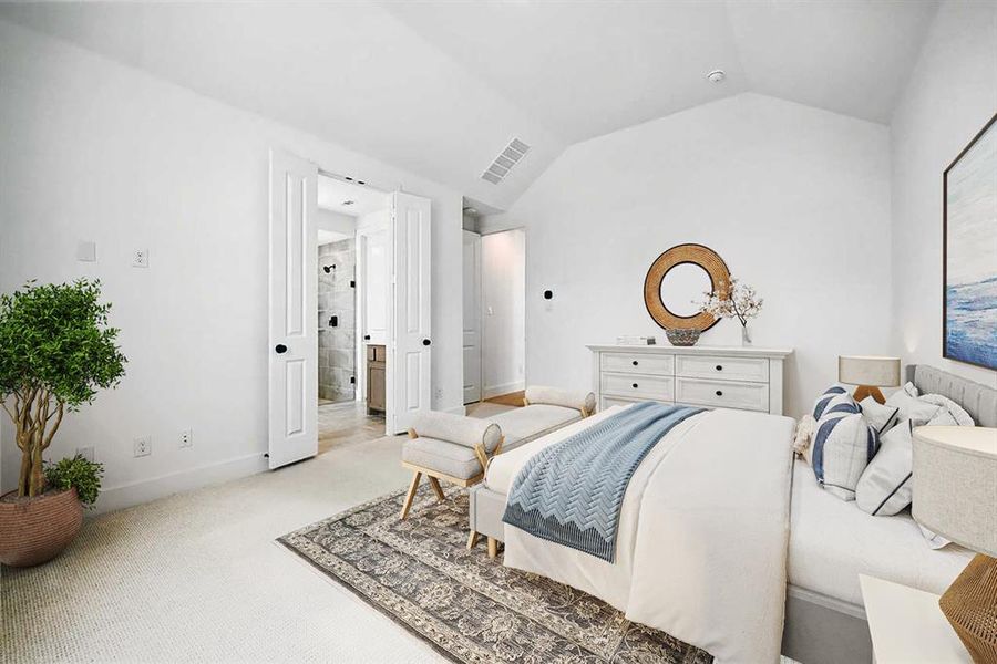 Bedroom with carpet and vaulted ceiling Bedroom with carpet and vaulted ceiling