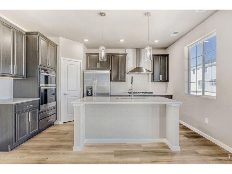 Furnished interior view inside a new home in Farmstead, Berthoud (Image 9).