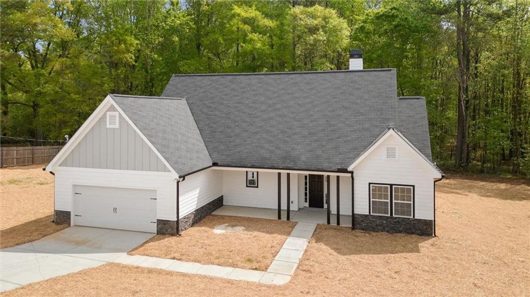 Front exterior of a new home in , Villa Rica, GA, highlighting curb appeal (Image 25).