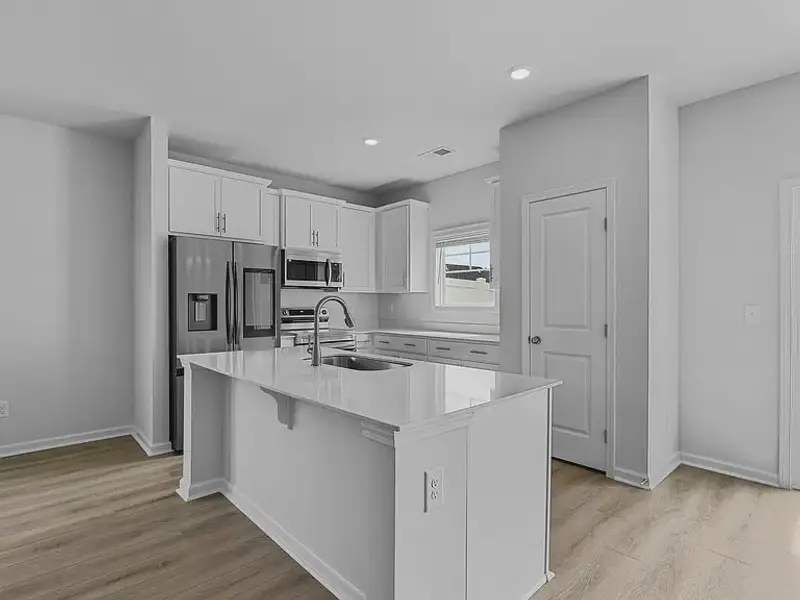Furnished interior view inside a new home in Percival Village, Columbia (Image 3).