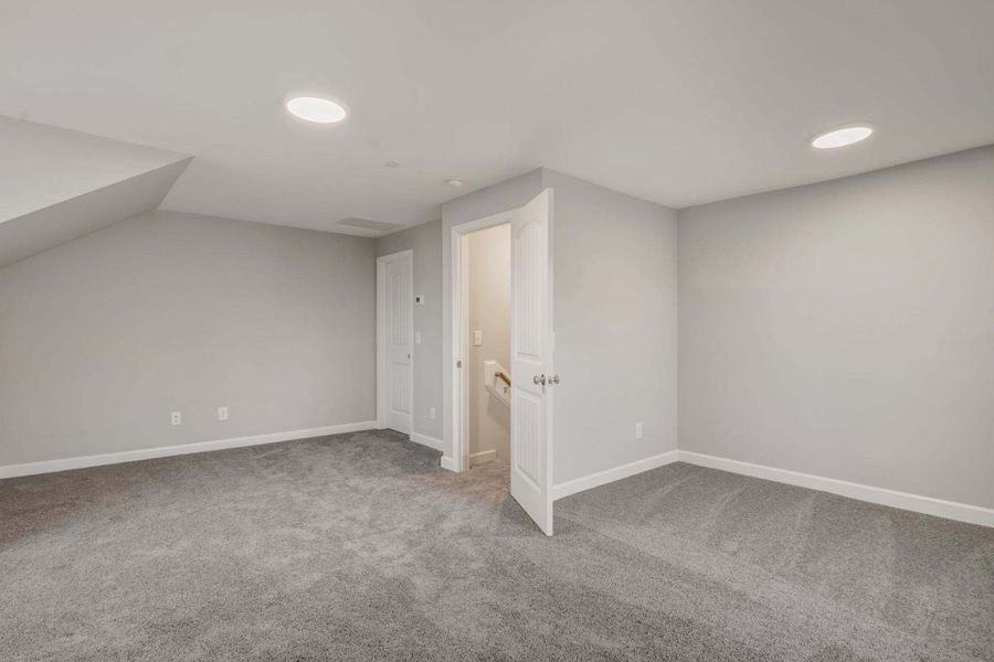 Representative unfurnished interior of a home built from the Garland by Caviness & Cates Communities in Bartlett Manor, Youngsville (Image 253). Representative unfurnished interior of a home built from the Garland by Caviness & Cates Communities in Bartlett Manor, Youngsville (Image 253).