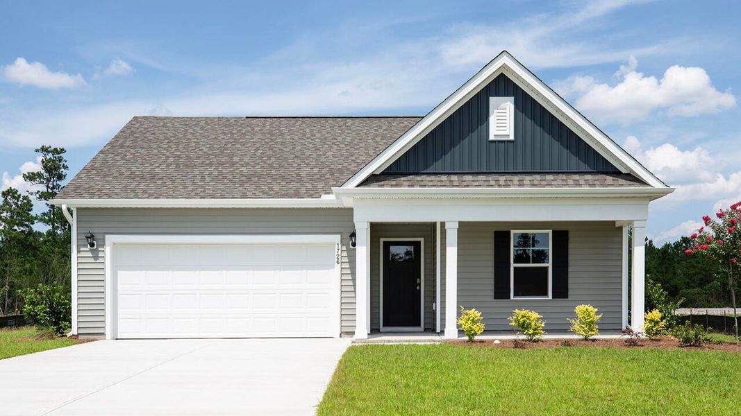 Front exterior of a new home in Sidbury Station, Castle Hayne, NC, highlighting curb appeal (Image 1).