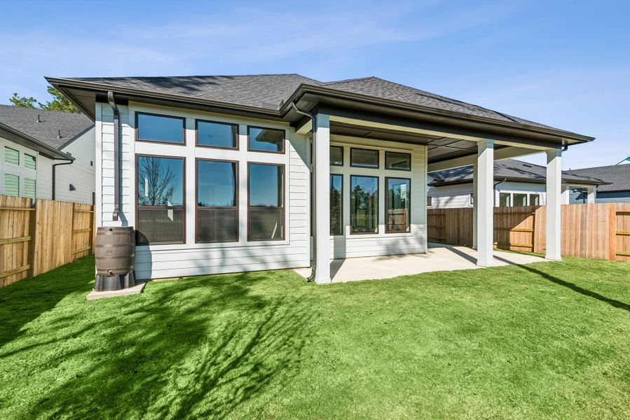 Exterior details and patio area of a home in ARTAVIA 50' Homesites, Conroe (Image 3).