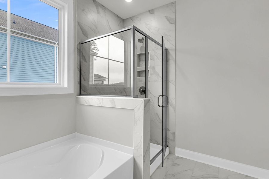 Furnished interior view inside a new home in Tidewater at Lakes of Cane Bay, Summerville (Image 11).