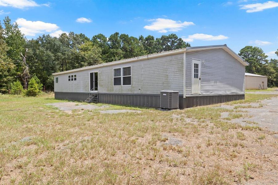 Front exterior of a new home in , Mount Pleasant, TX, highlighting curb appeal (Image 1).