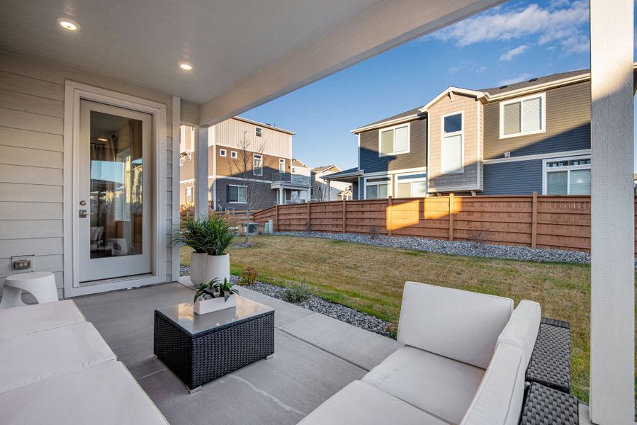Exterior details and patio area of a home in Reunion, Commerce City (Image 3).