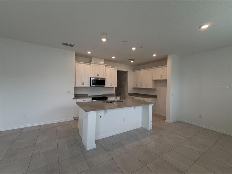 Furnished interior view inside a new home in Beresford Woods, Deland (Image 5).