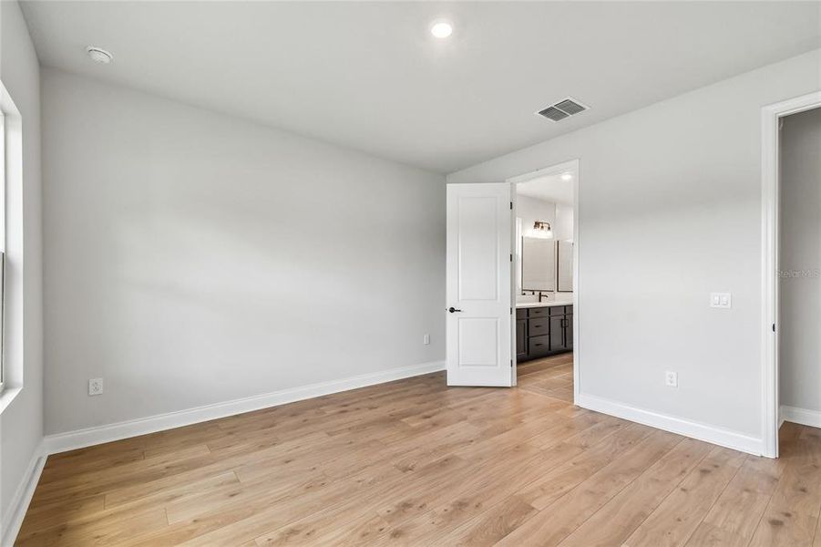 Spacious, unfurnished interior of a new home in Oakfield at Mount Dora Village Series, Mount Dora (Image 31).