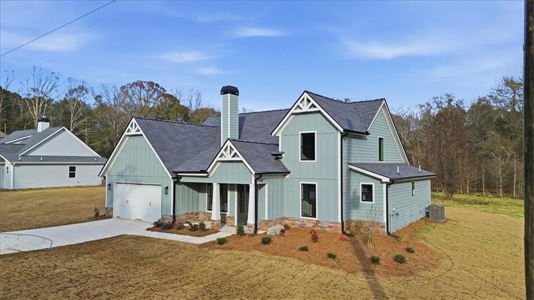 Front exterior of a new home in , Statham, GA, highlighting curb appeal (Image 33).