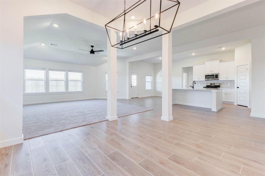 Elegant formal dining space with ample room for entertaining, located just off the kitchen and living area.