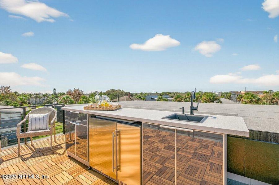 Exterior details and patio area of a home in , Neptune Beach (Image 45).