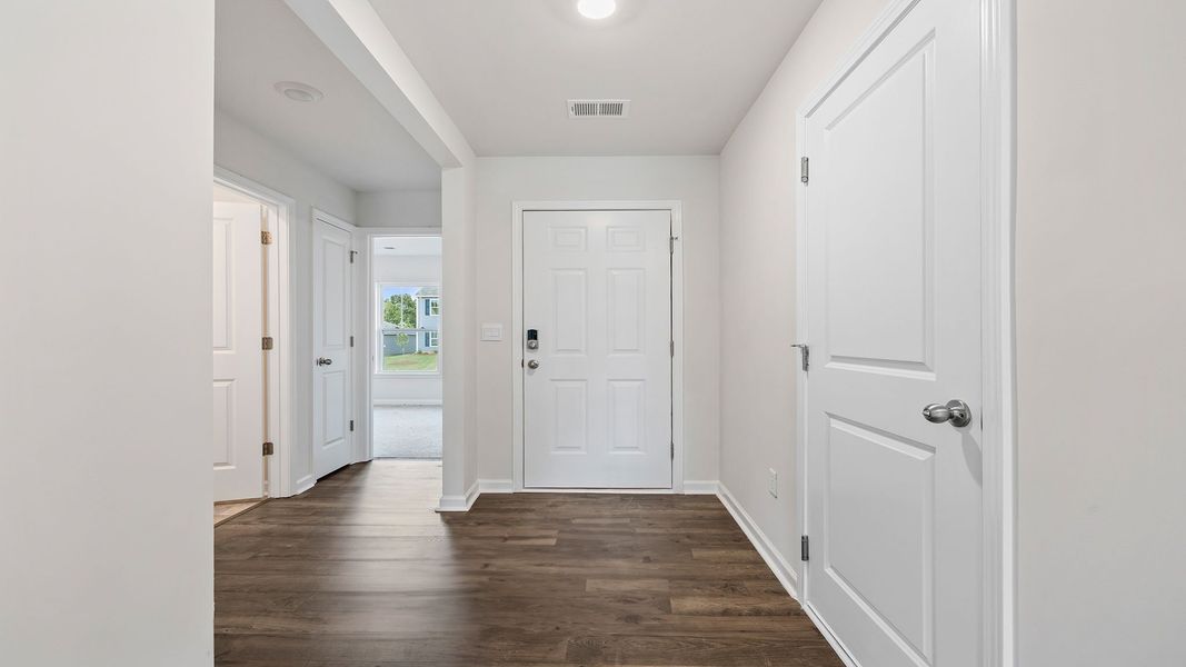 Spacious, unfurnished interior of a new home in Bentley Park, Greenwood (Image 15).