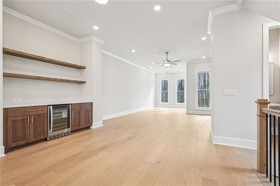 Main level has 10 foot ceilings with 8 foot windows and doors- nice flow and natural light illuminate this space.