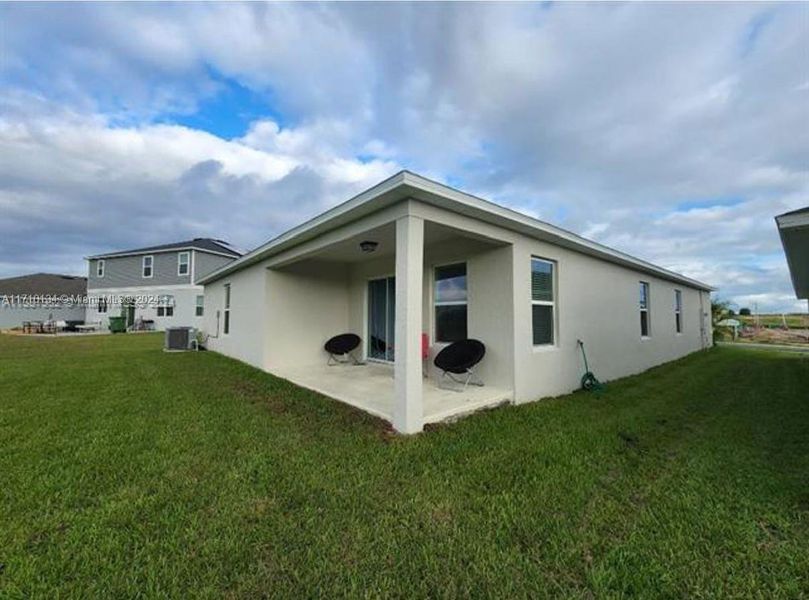 Front exterior of a new home in Lake Lucerne, Winter Haven, FL, highlighting curb appeal (Image 12). Front exterior of a new home in Lake Lucerne, Winter Haven, FL, highlighting curb appeal (Image 12).