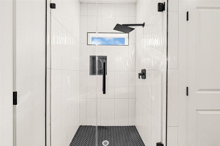 En suite primary shower En suite primary shower
