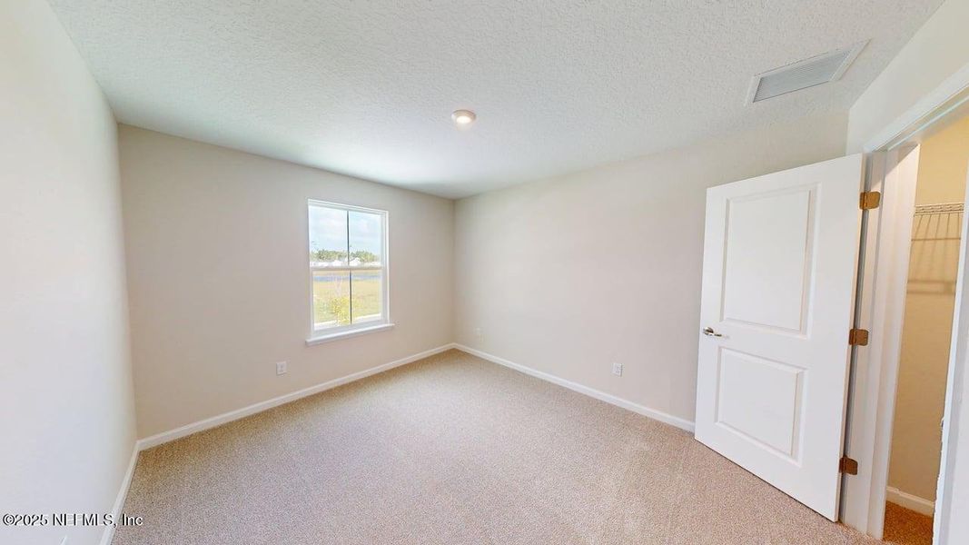 Spacious, unfurnished interior of a new home in Lakes at Bella Lago, Green Cove Springs (Image 10). Spacious, unfurnished interior of a new home in Lakes at Bella Lago, Green Cove Springs (Image 10).