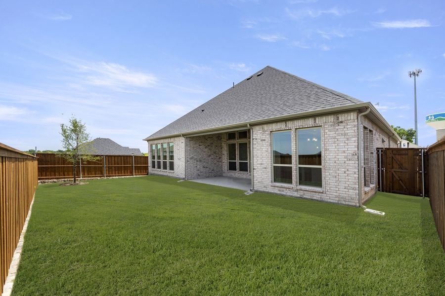 Exterior details and patio area of a home in Nelson Lake Estates, Rockwall (Image 20). Exterior details and patio area of a home in Nelson Lake Estates, Rockwall (Image 20).