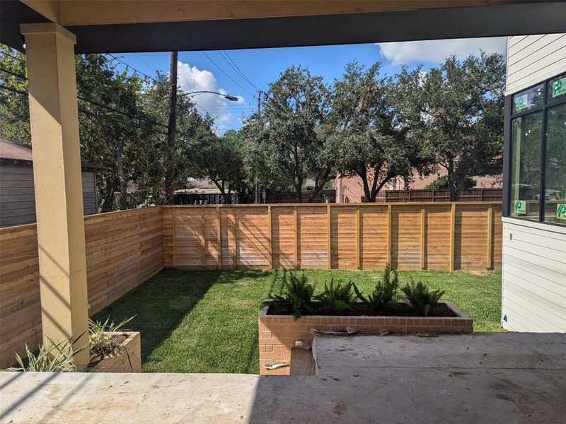 Enjoy dining al fresco on your porch surrounding with lovely landscaping.