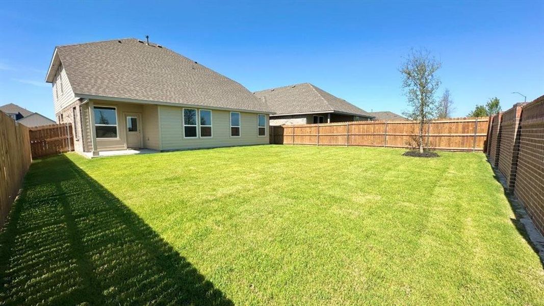 Front exterior of a new home in Rock Creek Ranch, Fort Worth, TX, highlighting curb appeal (Image 15). Front exterior of a new home in Rock Creek Ranch, Fort Worth, TX, highlighting curb appeal (Image 15).