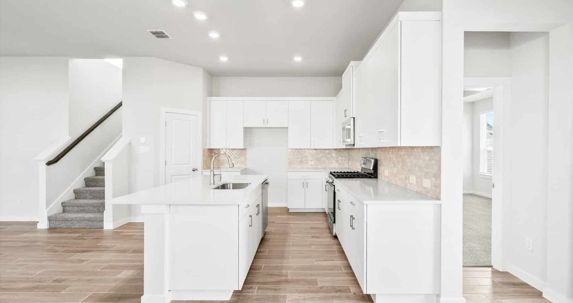 Furnished interior view inside a new home in Trace, San Marcos (Image 6).