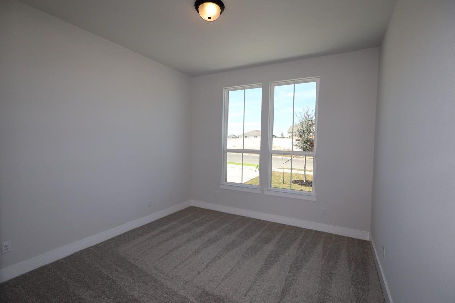 Spacious, unfurnished interior of a new home in Lariat, Liberty Hill (Image 23).