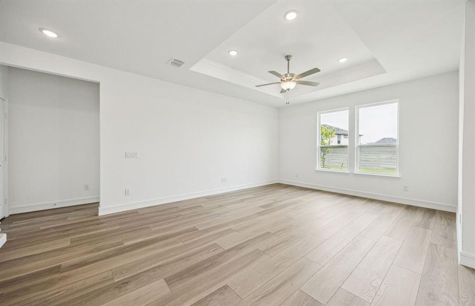 Airy gathering room showcases open concept floorplan *Real home pictured Airy gathering room showcases open concept floorplan *Real home pictured