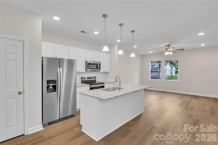Furnished interior view inside a new home in , Statesville (Image 28).