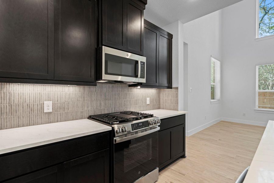Furnished interior view inside a new home in The Woodlands Hills, Willis (Image 9).