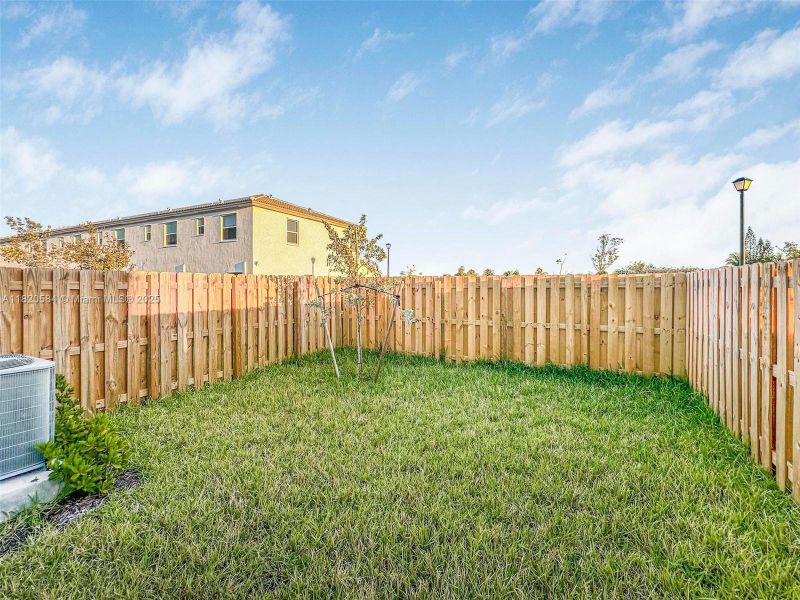 Exterior details and patio area of a home in Cedar Pointe: Cypress Collection, Homestead (Image 3). Exterior details and patio area of a home in Cedar Pointe: Cypress Collection, Homestead (Image 3).