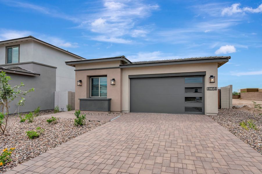 Front exterior of a new home in Terraza, San Tan Valley, AZ, highlighting curb appeal (Image 20).