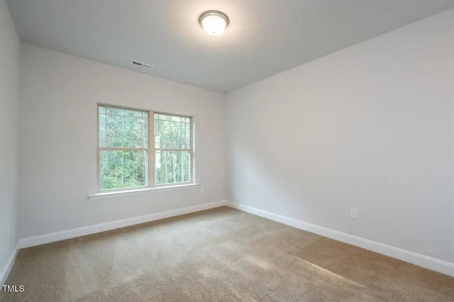 Representative unfurnished interior of a home built from the 2316 by Adams Homes in Hidden Pines, Cameron (Image 26).