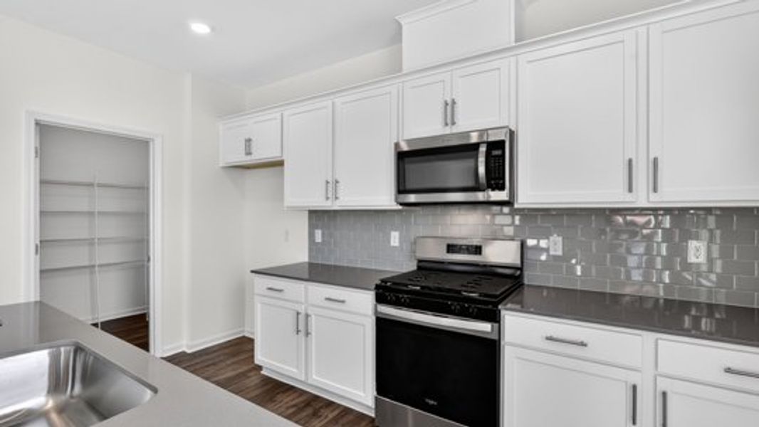 Furnished interior view inside a new home in The Reserve at Prestleigh, Wake Forest (Image 8).
