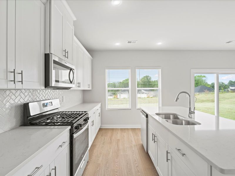 Furnished interior view inside a new home in Chatham Forest, Duncan (Image 4).