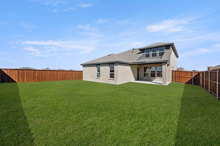 Front exterior of a new home in Myrtle Creek, Waxahachie, TX, highlighting curb appeal (Image 29). Front exterior of a new home in Myrtle Creek, Waxahachie, TX, highlighting curb appeal (Image 29).