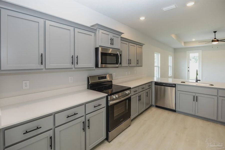 Furnished interior view inside a new home in Parkland Place, Pace (Image 6).